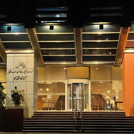 Pearl Of The Orient Tower, In Front Of Us Embassy Apartment Manila Exterior photo